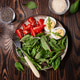 Balanced salad with green lettuce, strawberries, boiled eggs for lunch on a wooden table. Balanced n Balanced salad with green lettuce, strawberries, boiled eggs for lunch on a wooden table. Balanced n - PhotoDune Item for Sale