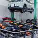 High-Voltage EV Battery Pack Removed for Service in Modern Electric Vehicle Workshop High-Voltage EV Battery Pack Removed for Service in Modern Electric Vehicle Workshop - PhotoDune Item for Sale