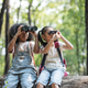 Diverse Children Using Binoculars and Camera in Forest, Outdoor Exploration and Learning Concept Diverse Children Using Binoculars and Camera in Forest, Outdoor Exploration and Learning Concept - PhotoDune Item for Sale