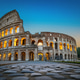The Colosseum illuminated at sunset with stone pavement in the foreground. The Colosseum illuminated at sunset with stone pavement in the foreground. - PhotoDune Item for Sale