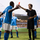 Soccer Referee Shows Red Card During Player Protest in Stadium Soccer Referee Shows Red Card During Player Protest in Stadium - PhotoDune Item for Sale