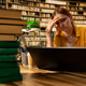 Worried young woman studying materials on laptop at library table Worried young woman studying materials on laptop at library table - PhotoDune Item for Sale
