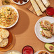 Flatlay frame of Latin American dishes: pupusas, arepas, curtido, tajadas, humitas, yuca, copy space Flatlay frame of Latin American dishes: pupusas, arepas, curtido, tajadas, humitas, yuca, copy space - PhotoDune Item for Sale
