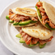 Arepas stuffed with pulled pork and avocado on white plate closeup Arepas stuffed with pulled pork and avocado on white plate closeup - PhotoDune Item for Sale
