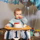 Toddler Baby boy eating himself birthday cake by spoon. First birthday family celebration. Child cel Toddler Baby boy eating himself birthday cake by spoon. First birthday family celebration. Child cel - PhotoDune Item for Sale
