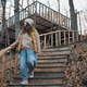 Mid adult woman at walk alone in autumn park Mid adult woman at walk alone in autumn park - PhotoDune Item for Sale