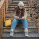 Mid adult woman using phone in autumn park Mid adult woman using phone in autumn park - PhotoDune Item for Sale