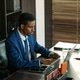 Black Man Lawyer Working on Divorce Case at Office Desk Black Man Lawyer Working on Divorce Case at Office Desk - PhotoDune Item for Sale
