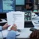 Business Team Reviewing Cybersecurity Incident Report in Office Business Team Reviewing Cybersecurity Incident Report in Office - PhotoDune Item for Sale