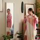 Adult Woman Choosing Dress While Preparing for Vacation Trip Adult Woman Choosing Dress While Preparing for Vacation Trip - PhotoDune Item for Sale