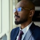 Middle Aged Businessman Looking in Window in Corporate Office Middle Aged Businessman Looking in Window in Corporate Office - PhotoDune Item for Sale
