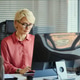 Middle Aged Woman Working in Call Center Office Support Role Middle Aged Woman Working in Call Center Office Support Role - PhotoDune Item for Sale