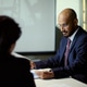 South Asian Businessman Reviewing Documents in Oil Industry Meeting South Asian Businessman Reviewing Documents in Oil Industry Meeting - PhotoDune Item for Sale