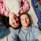 Portrait of Adult Couple Preparing for Vacation and Taking Selfie on Bed Portrait of Adult Couple Preparing for Vacation and Taking Selfie on Bed - PhotoDune Item for Sale