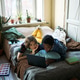 Teenage Couple Studying on Laptop in Bedroom for Online Learning Teenage Couple Studying on Laptop in Bedroom for Online Learning - PhotoDune Item for Sale