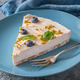 Creamy Mascarpone Cheesecake Slice Served With Blueberries Pistachios Maple Syrup And Mint Leaves Creamy Mascarpone Cheesecake Slice Served With Blueberries Pistachios Maple Syrup And Mint Leaves - PhotoDune Item for Sale