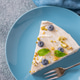 Creamy Mascarpone Cheesecake Slice Served With Blueberries Pistachios Maple Syrup And Mint Leaves Creamy Mascarpone Cheesecake Slice Served With Blueberries Pistachios Maple Syrup And Mint Leaves - PhotoDune Item for Sale