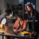 Diverse Coworkers Collaborating on Laptop in Office at Night Diverse Coworkers Collaborating on Laptop in Office at Night - PhotoDune Item for Sale