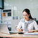 Successful Asian Businesswoman Analyzing Finance on Tablet and Laptop at modern Office Desk tax, rep Successful Asian Businesswoman Analyzing Finance on Tablet and Laptop at modern Office Desk tax, rep - PhotoDune Item for Sale