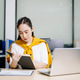 Successful Asian Businesswoman Analyzing Finance on Tablet and Laptop at modern Office Desk tax, rep Successful Asian Businesswoman Analyzing Finance on Tablet and Laptop at modern Office Desk tax, rep - PhotoDune Item for Sale