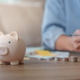 Savings and tax refund concept with piggy bank on table Savings and tax refund concept with piggy bank on table - PhotoDune Item for Sale