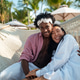 Couple enjoying their tropical vacation with peace of mind, secured by reliable travel insurance Couple enjoying their tropical vacation with peace of mind, secured by reliable travel insurance - PhotoDune Item for Sale