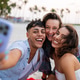 Young adults expressing genuine happiness and the love of life during a sunny holiday Young adults expressing genuine happiness and the love of life during a sunny holiday - PhotoDune Item for Sale