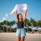 Trendy young traveler enjoying sunny weather and coastal breeze on a luxury tropical island resort Trendy young traveler enjoying sunny weather and coastal breeze on a luxury tropical island resort - PhotoDune Item for Sale