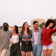 Friends enjoying a fun travel adventure on a tropical beach at sunset, making lasting memories Friends enjoying a fun travel adventure on a tropical beach at sunset, making lasting memories - PhotoDune Item for Sale