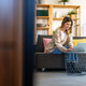 Home office. One smiling woman using laptop. Work, freelance, social media, technology concept. Home office. One smiling woman using laptop. Work, freelance, social media, technology concept. - PhotoDune Item for Sale