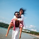Couple enjoying their tropical vacation with peace of mind, secured by reliable travel insurance Couple enjoying their tropical vacation with peace of mind, secured by reliable travel insurance - PhotoDune Item for Sale