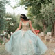Young woman walking in formal gown through garden path vertical Young woman walking in formal gown through garden path vertical - PhotoDune Item for Sale