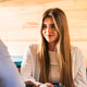 Young woman smiling in camper van interior Young woman smiling in camper van interior - PhotoDune Item for Sale