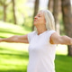 Senior woman practicing outdoor meditation and deep breathing Senior woman practicing outdoor meditation and deep breathing - PhotoDune Item for Sale