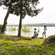 Man proposing marriage to woman by a lake Man proposing marriage to woman by a lake - PhotoDune Item for Sale