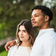 Couple standing outdoors embracing travel and adventure Couple standing outdoors embracing travel and adventure - PhotoDune Item for Sale