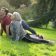 Seniors practicing yoga in cobra pose outdoors Seniors practicing yoga in cobra pose outdoors - PhotoDune Item for Sale