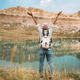 Traveler Backpacking in the Mountain Lakes Traveler Backpacking in the Mountain Lakes - PhotoDune Item for Sale