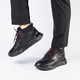 Stylish leather black short men's autumn sneakers on a white background on men's legs. Sneakers Stylish leather black short men's autumn sneakers on a white background on men's legs. Sneakers - PhotoDune Item for Sale