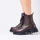 Women's brown spring boots made of genuine leather on a woman's leg. New collection of women's boots Women's brown spring boots made of genuine leather on a woman's leg. New collection of women's boots - PhotoDune Item for Sale