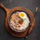 Asian soup rice noodles duck meat egg chopsticks ramen bowl dark rustic background Asian soup rice noodles duck meat egg chopsticks ramen bowl dark rustic background - PhotoDune Item for Sale
