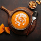 Pumpkin soup croutons cream fresh pumpkin slices wooden board dark background autumn winter Pumpkin soup croutons cream fresh pumpkin slices wooden board dark background autumn winter - PhotoDune Item for Sale