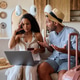 Worried couple checking their travel booking confirmation on laptop. Worried couple checking their travel booking confirmation on laptop. - PhotoDune Item for Sale