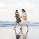 Happy Friends Running and Playing on Tropical Beach Happy Friends Running and Playing on Tropical Beach - PhotoDune Item for Sale