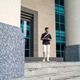 Asian Indonesian Man Walking While Using Smartphone Outdoors Asian Indonesian Man Walking While Using Smartphone Outdoors - PhotoDune Item for Sale