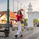 Stylish Indonesian Woman Walking in Batik Fashion at Malioboro Yogyakarta Stylish Indonesian Woman Walking in Batik Fashion at Malioboro Yogyakarta - PhotoDune Item for Sale