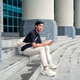 Asian Indonesian Man Using Smartphone Sitting on Urban Building Steps Asian Indonesian Man Using Smartphone Sitting on Urban Building Steps - PhotoDune Item for Sale