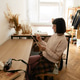 Young creative woman working on a tablet in a cozy fashion studio and home workspace Young creative woman working on a tablet in a cozy fashion studio and home workspace - PhotoDune Item for Sale