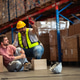 Warehouse worker suffering an accident from falling from a height while working in a factory facilit Warehouse worker suffering an accident from falling from a height while working in a factory facilit - PhotoDune Item for Sale