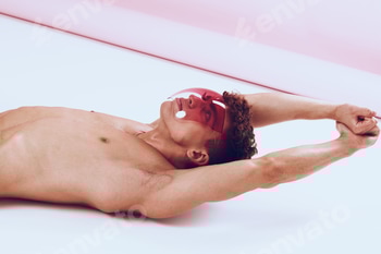 Stylish male model lounging on floor with hands stretched, wearing trendy red sunglasses. Relaxation 2 E117KCNH.jpg?w=350&h=350&cf fit=scale down&mark=https%3A%2F%2Fassets.market storefront.envato static.com%2Fwatermarks%2Fphoto 260724